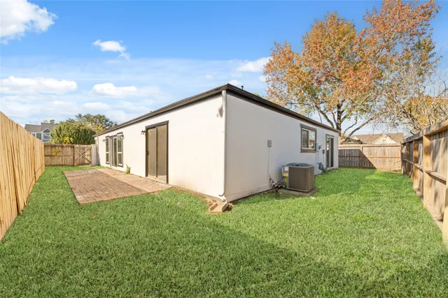 a view of a backyard with a garden