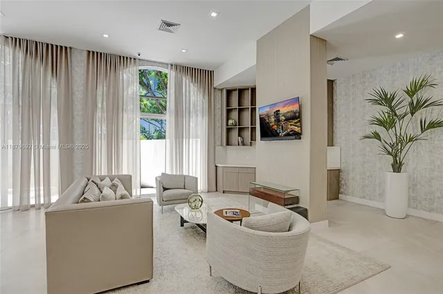 an entryway with a chandelier