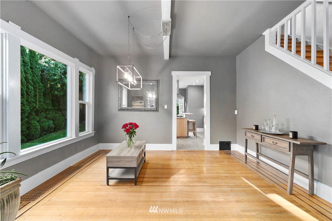 1625 27th Avenue Seattle, WA 98122 - Photo 11 of 40 a living room with furniture and windows