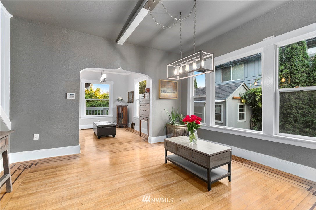 1625 27th Avenue Seattle, WA 98122 - Photo 12 of 40 a living room with furniture and a potted plant