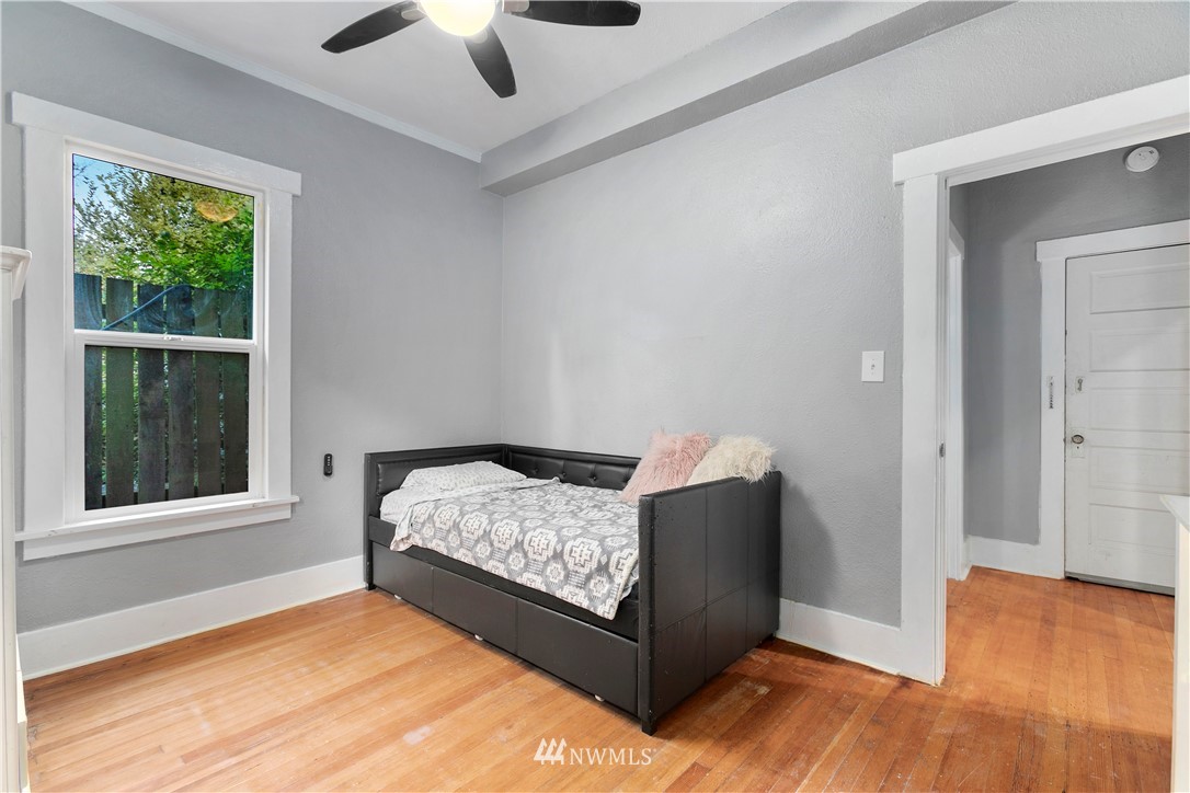 1625 27th Avenue Seattle, WA 98122 - Photo 27 of 40 a room with a bed and window