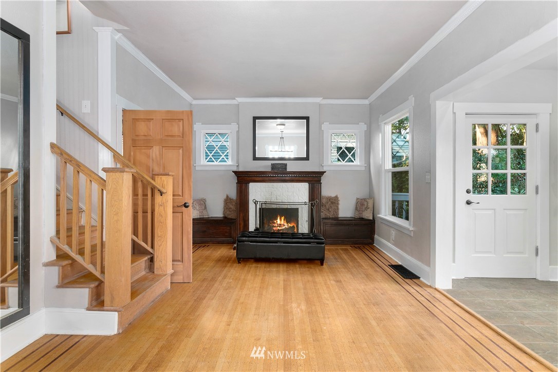 1625 27th Avenue Seattle, WA 98122 - Photo 8 of 40 a living room with furniture and a fireplace