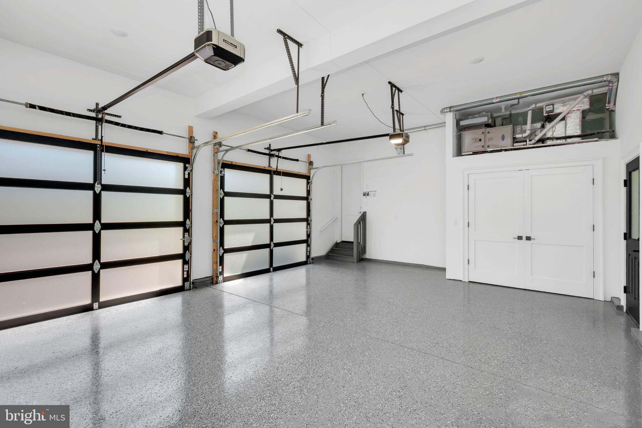 32 Gulick Road Princeton, NJ 08540 - Photo 47 of 56 Spacious modern garage with sleek doors.