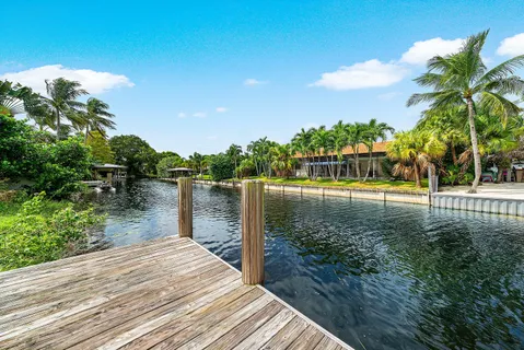 an aerial view of a house with a garden