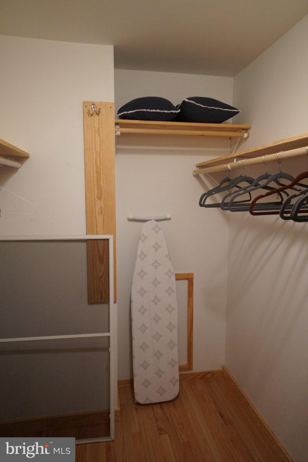 150 Sharp Ridge Lane Franklin, WV 26807 - Photo 31 of 69 Spacious closet with organized shelves.