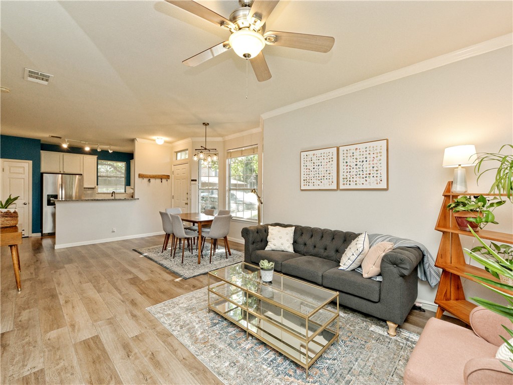 a living room with furniture and a table