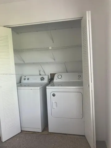 a view of an empty room with empty racks