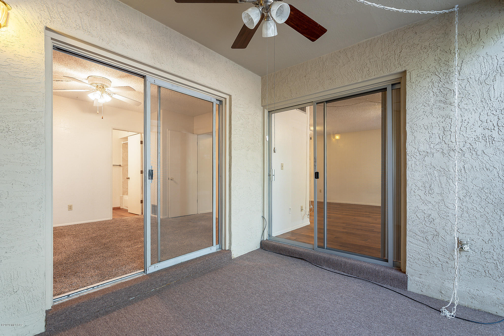3750 North Country Club Road, Unit 7 Tucson, AZ 85716 - Photo 17 of 26 an empty room that has a glass door and shower