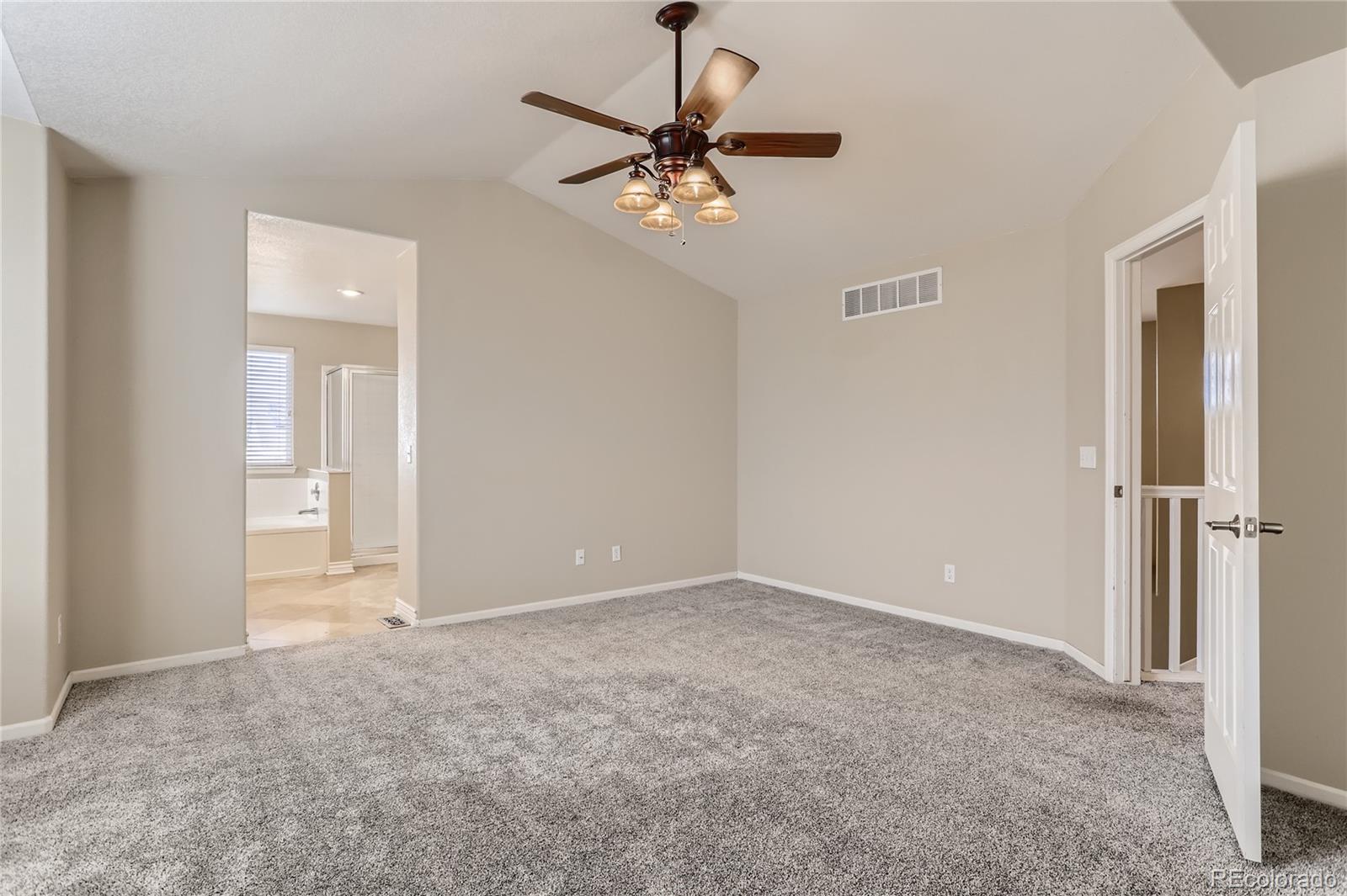 3905 South Kirk Way Aurora, CO 80013 - Photo 16 of 33 a view of an empty room with a window