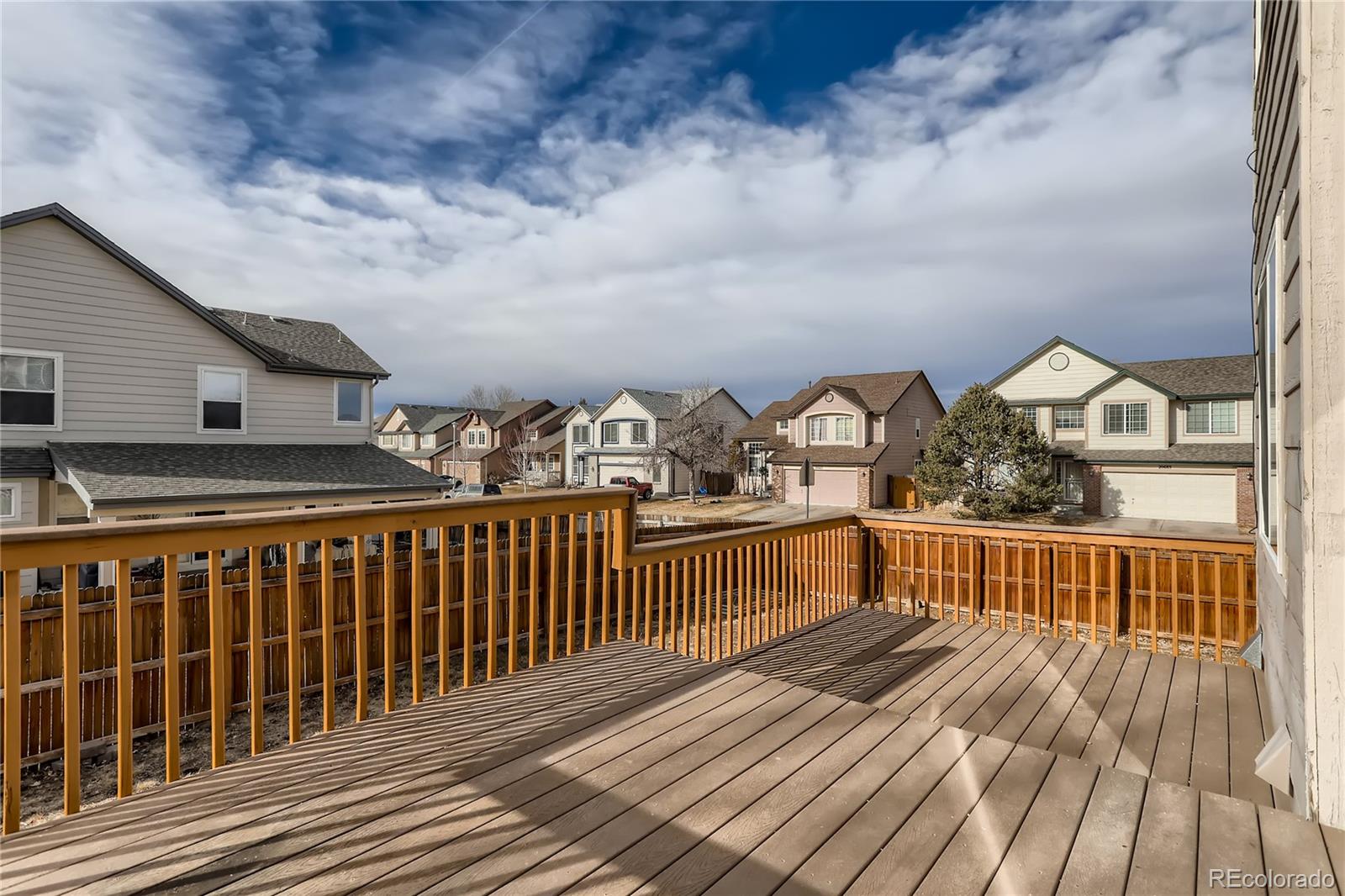 3905 South Kirk Way Aurora, CO 80013 - Photo 28 of 33 a view of balcony with wooden floor