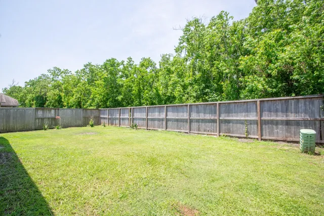 a view of a outdoor space with a swimming pool