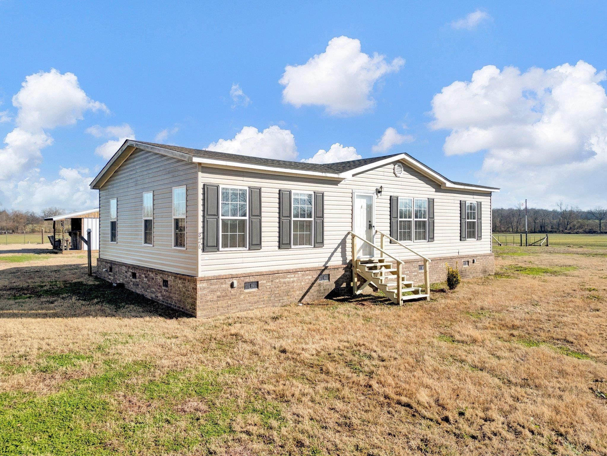 826 Nelson Road Brighton, TN 38011 - Photo 1 of 38 Manufactured / mobile home featuring a front lawn