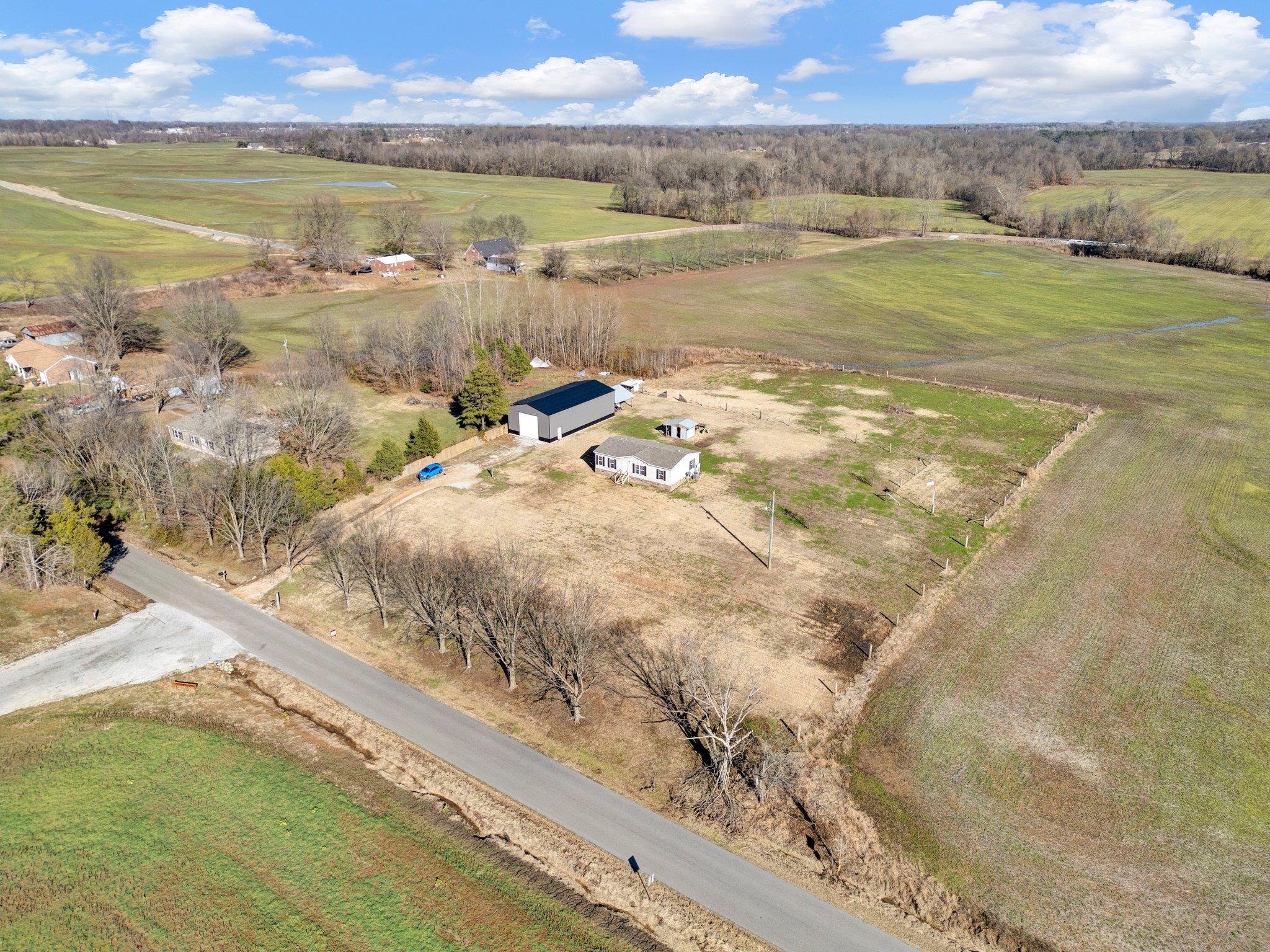 826 Nelson Road Brighton, TN 38011 - Photo 15 of 38 Drone / aerial view with a rural view
