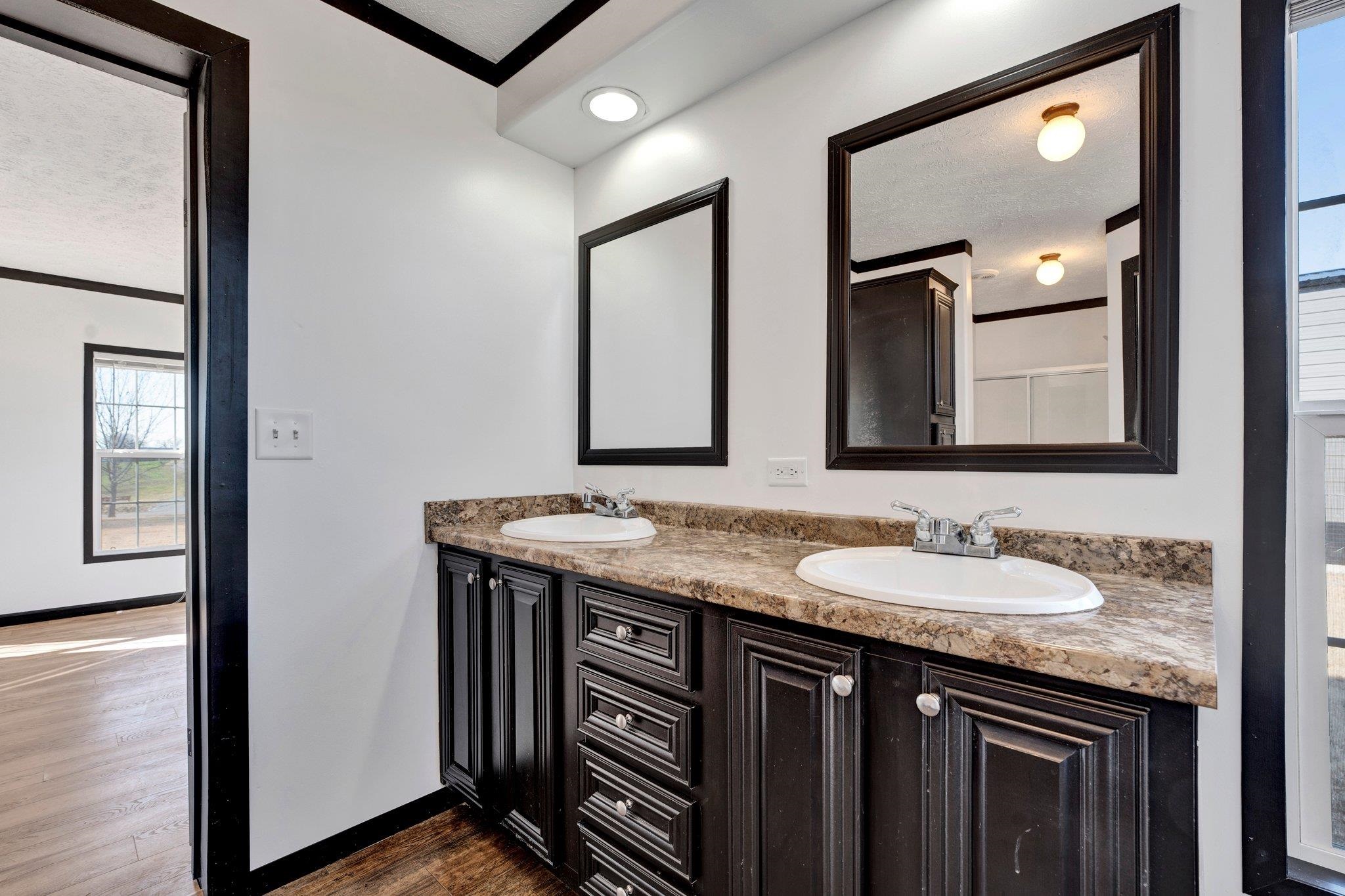 826 Nelson Road Brighton, TN 38011 - Photo 32 of 38 Bathroom featuring crown molding, vanity, and hardwood / wood-style flooring