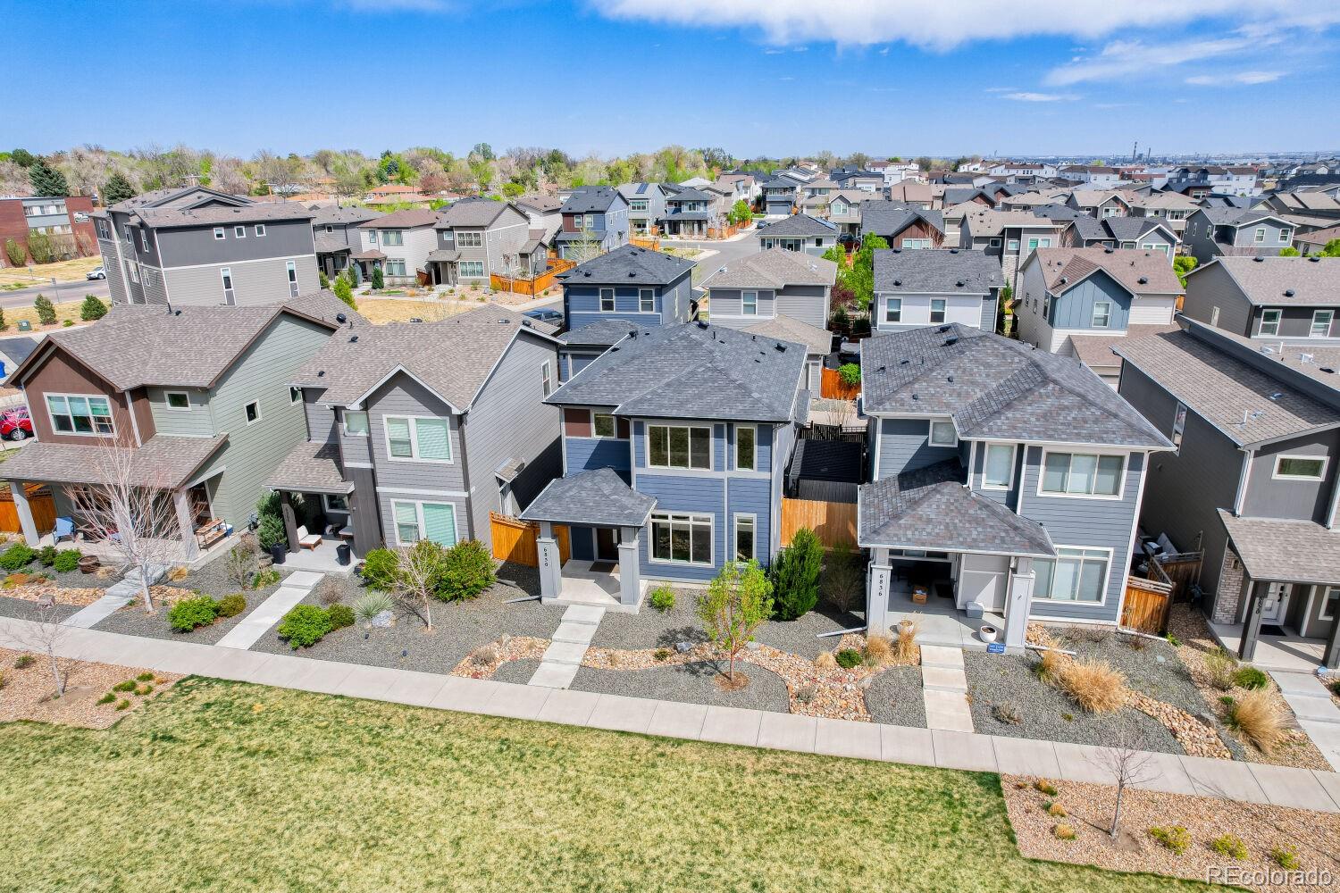 6850 Decatur Street Denver, CO 80221 - Photo 4 of 30 an aerial view of residential houses with outdoor space