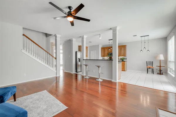 a view of kitchen with cabinets and wooden floor