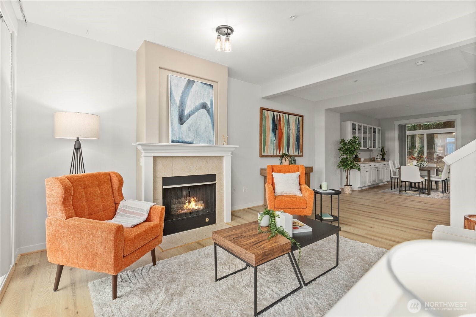 23300 Southeast Black Nugget Road, Unit D3 Issaquah, WA 98029 - Photo 14 of 35 a living room with furniture and a fireplace