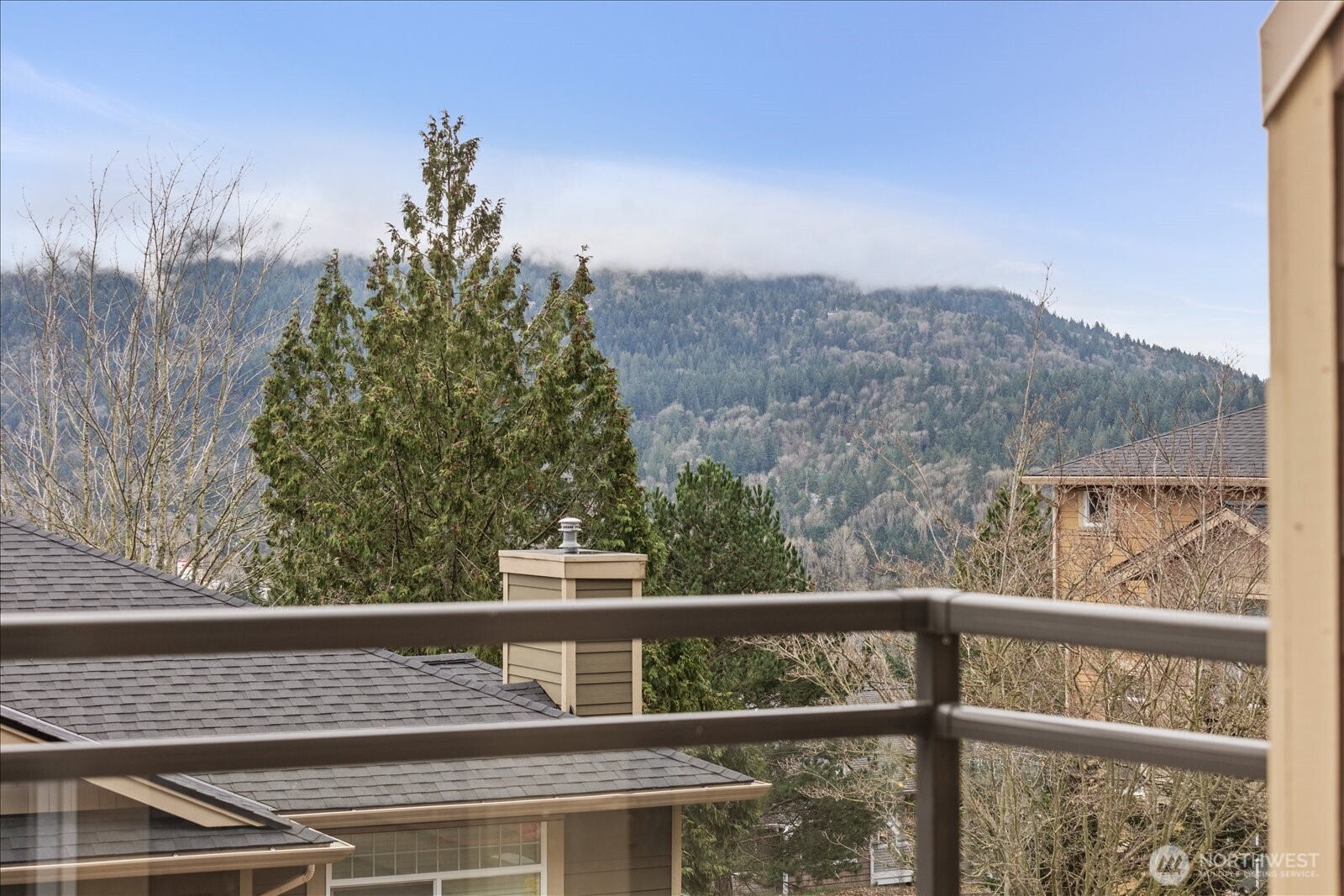 23300 Southeast Black Nugget Road, Unit D3 Issaquah, WA 98029 - Photo 18 of 35 a view of a balcony with chairs