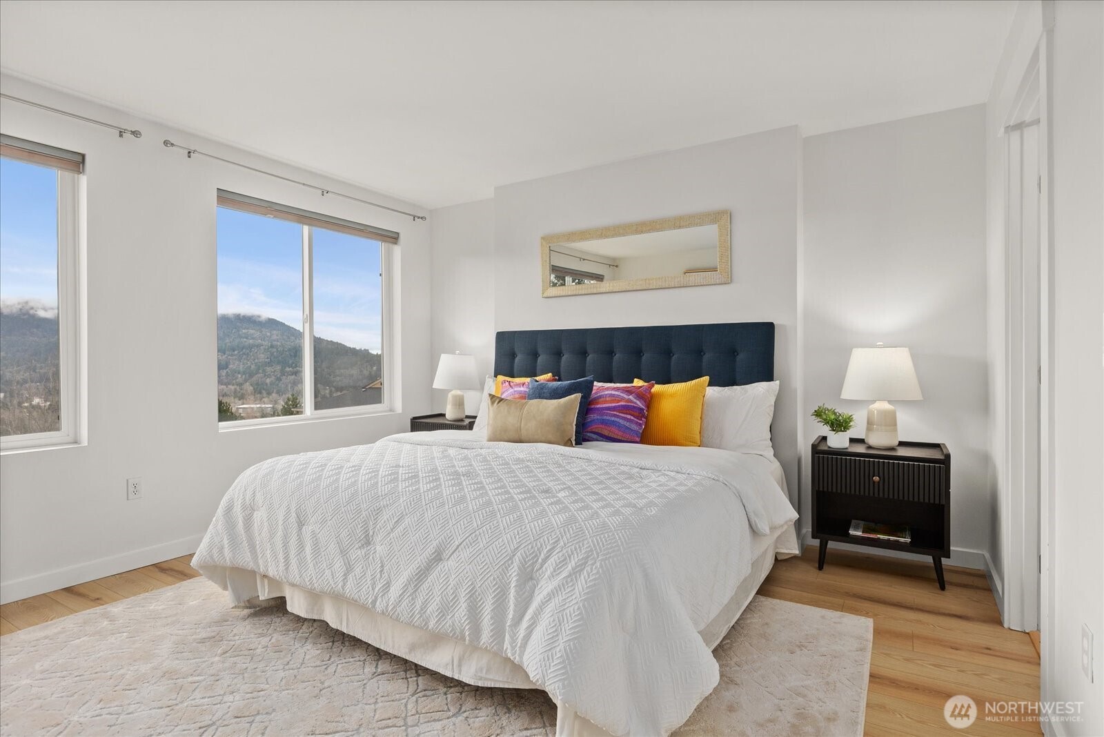 23300 Southeast Black Nugget Road, Unit D3 Issaquah, WA 98029 - Photo 20 of 35 a bedroom with a bed and a window