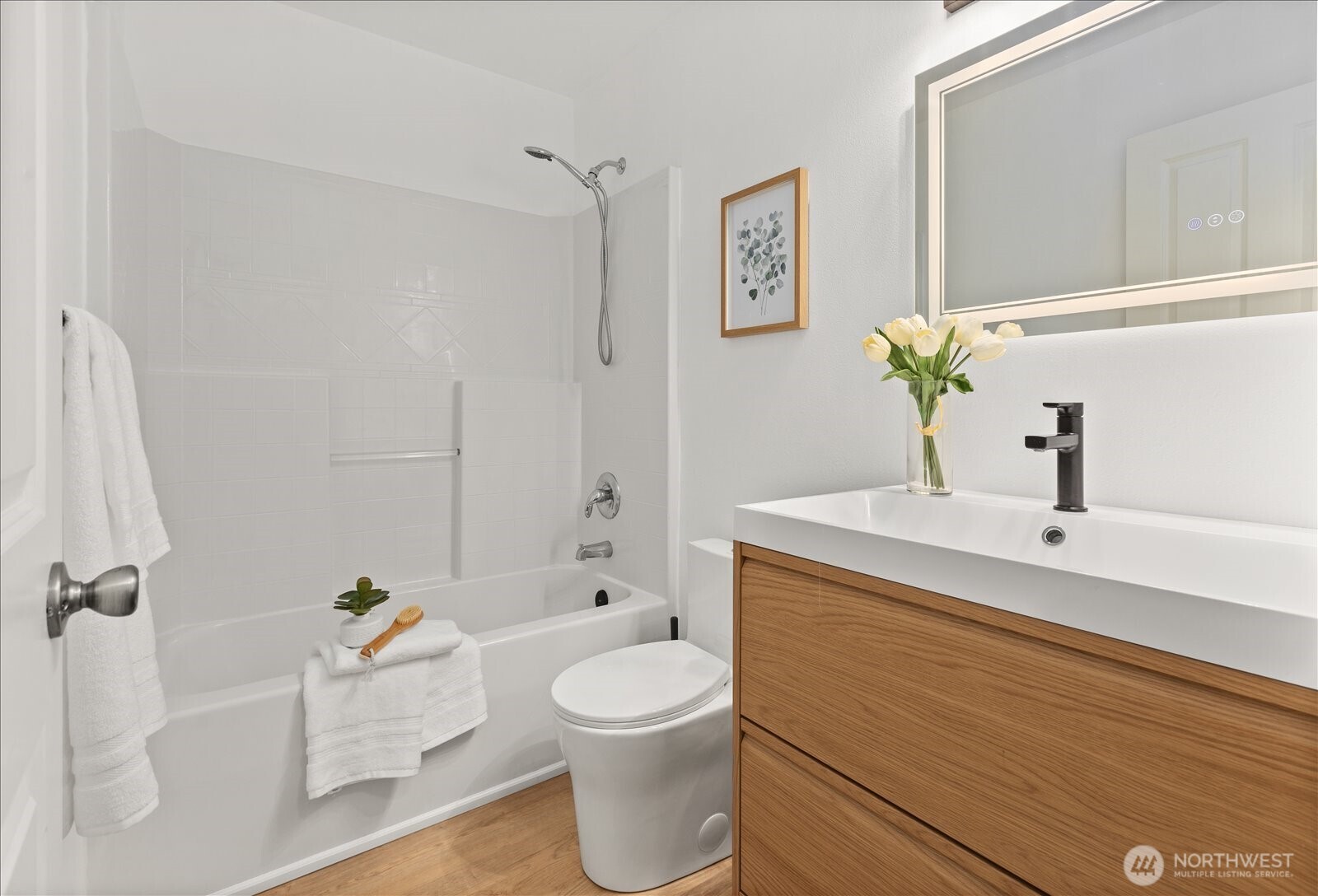 23300 Southeast Black Nugget Road, Unit D3 Issaquah, WA 98029 - Photo 27 of 35 a bathroom with a sink a toilet and shower