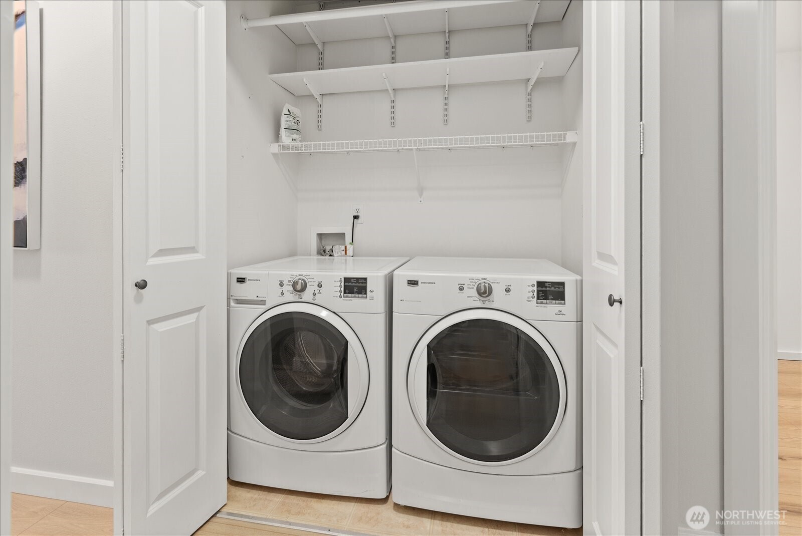 23300 Southeast Black Nugget Road, Unit D3 Issaquah, WA 98029 - Photo 28 of 35 a utility room with dryer and washer