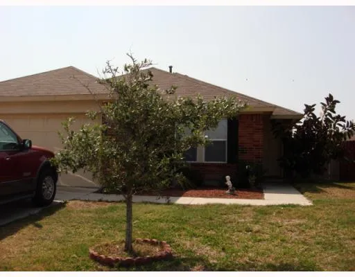 a front view of house with yard