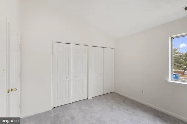 a view of a room with a window