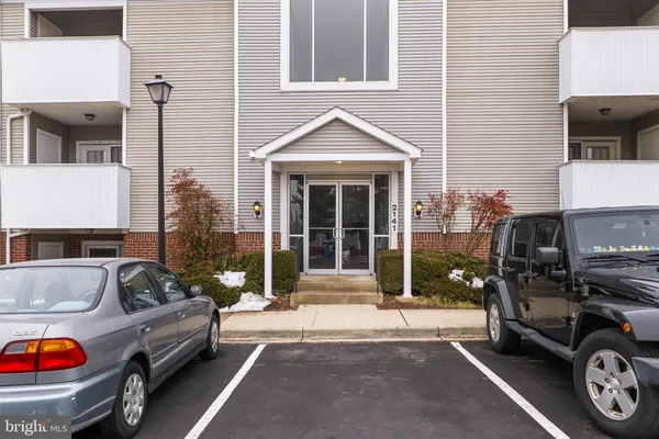 a car parked in front of a house
