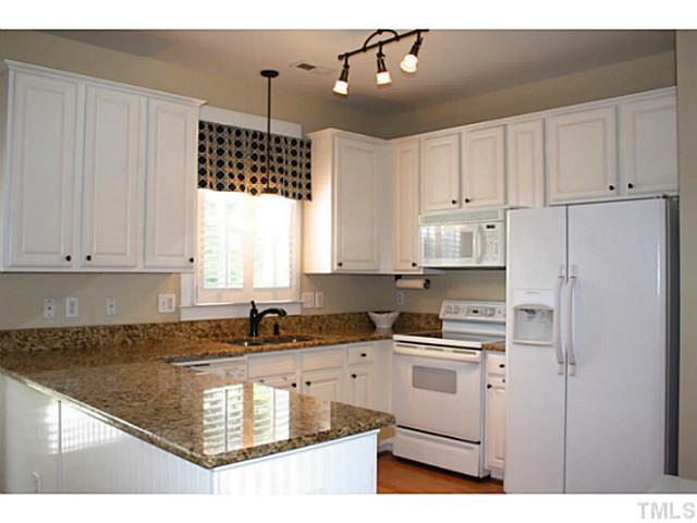 10732 Cokesbury Lane Raleigh, NC 27614 - Photo 3 of 21 NEW granite coutertops in this bright and sunny kitchen!
