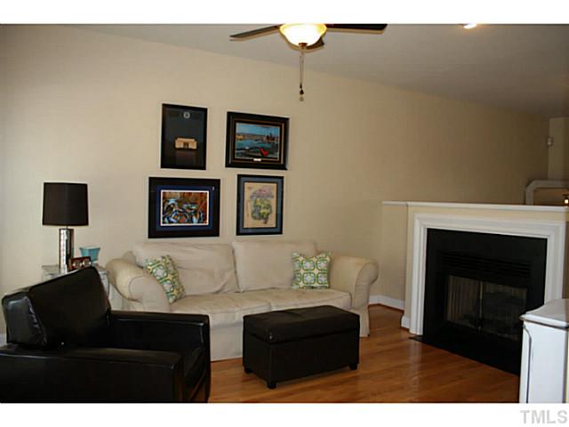 10732 Cokesbury Lane Raleigh, NC 27614 - Photo 6 of 21 A cozy fireplace in the den is just the right thing for a cool evening or a little ambiance!