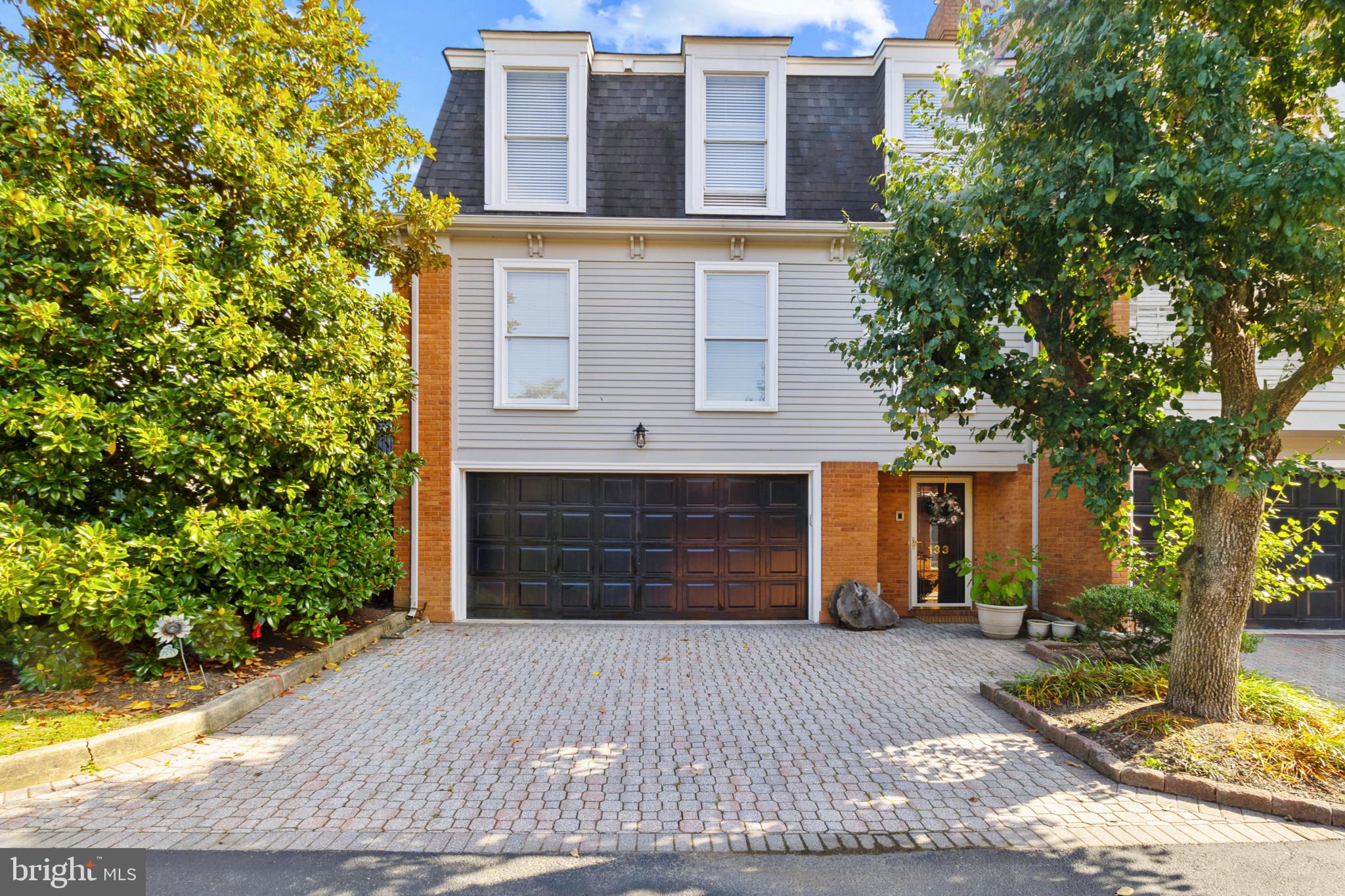 133 Plum Street Moorestown, NJ 08057 - Photo 1 of 54 a front view of a house with a yard and garage