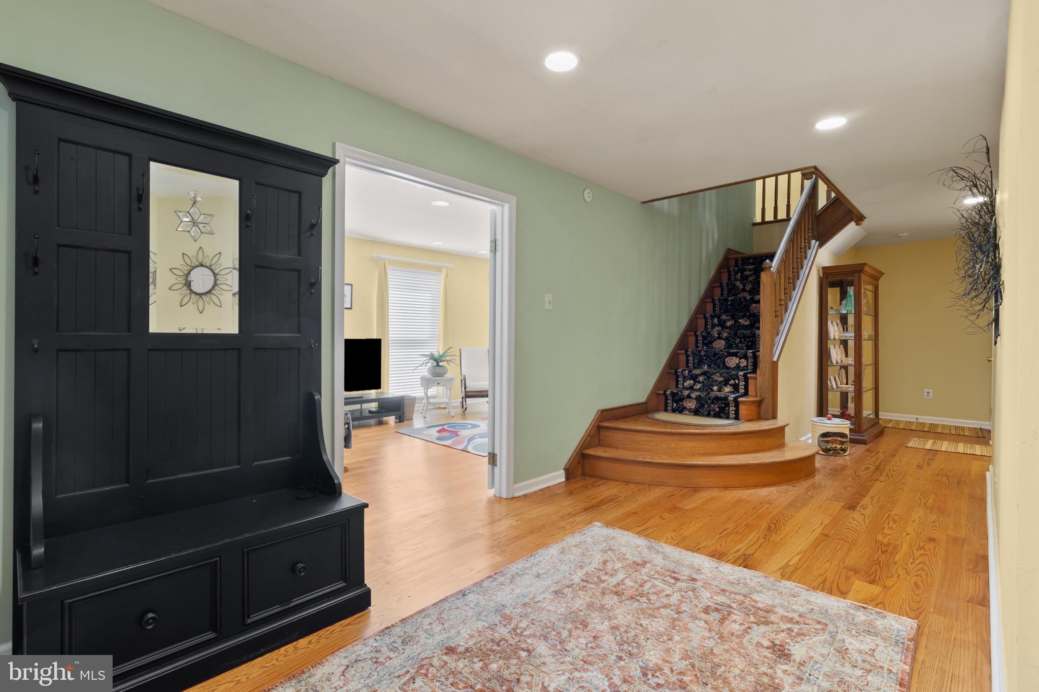 133 Plum Street Moorestown, NJ 08057 - Photo 18 of 54 a view of a hallway with furniture and staircase