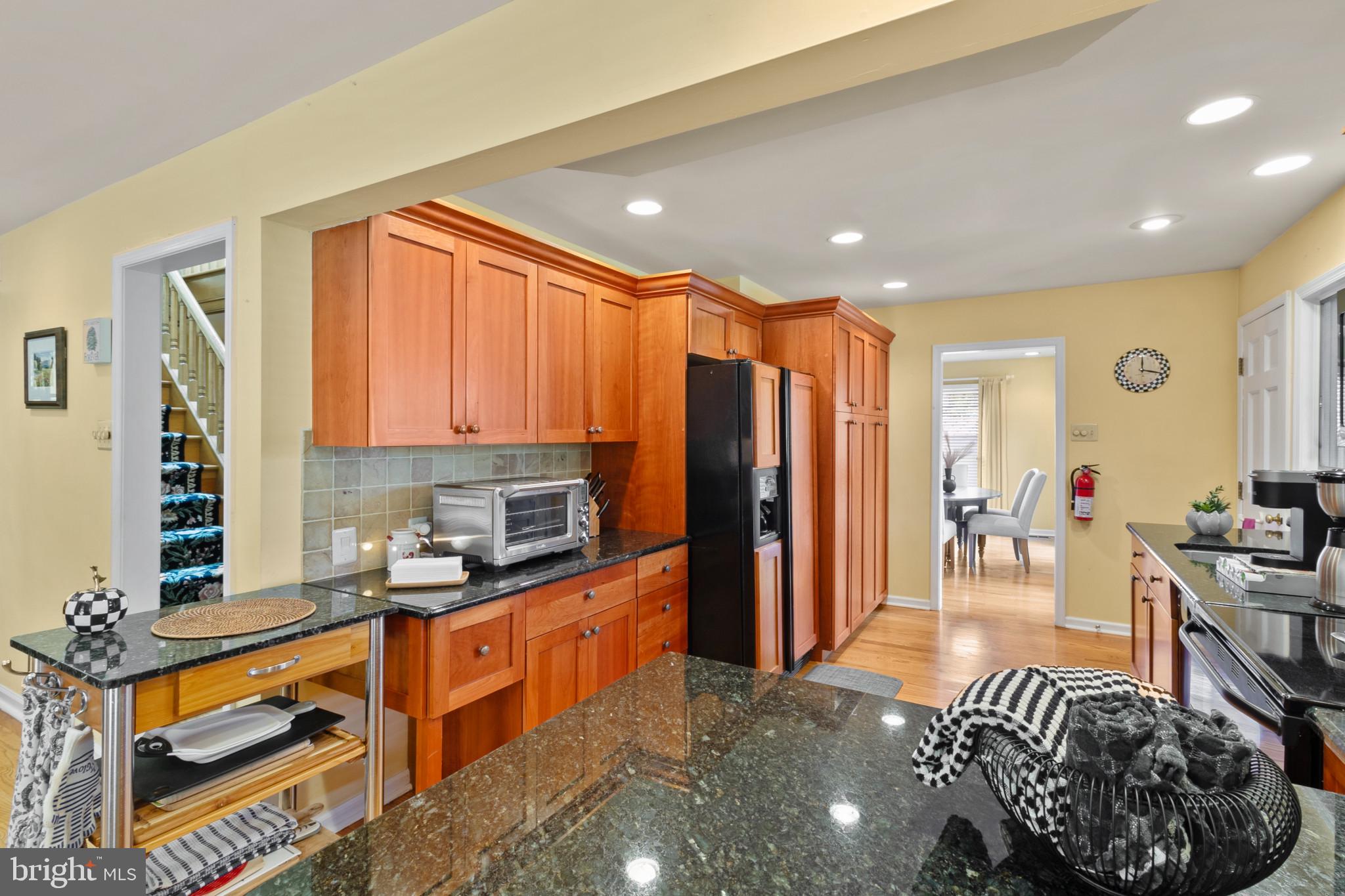133 Plum Street Moorestown, NJ 08057 - Photo 29 of 54 a kitchen with stainless steel appliances granite countertop a refrigerator and a sink