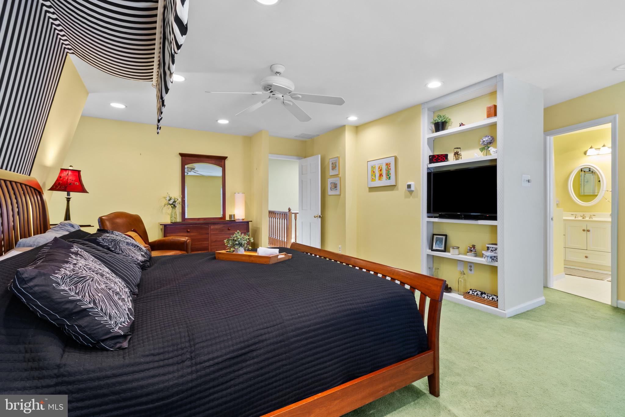 133 Plum Street Moorestown, NJ 08057 - Photo 40 of 54 a bedroom with a bed and a flat screen tv