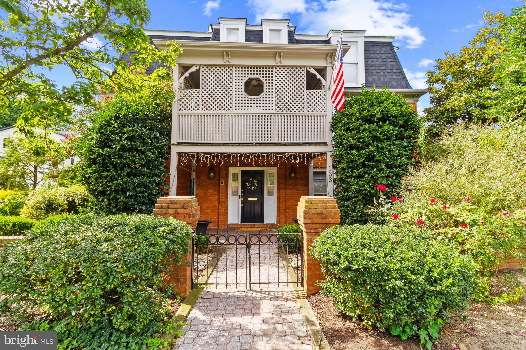 133 Plum Street Moorestown, NJ 08057 - Photo 4 of 54 a view of a house with potted plants and a large tree