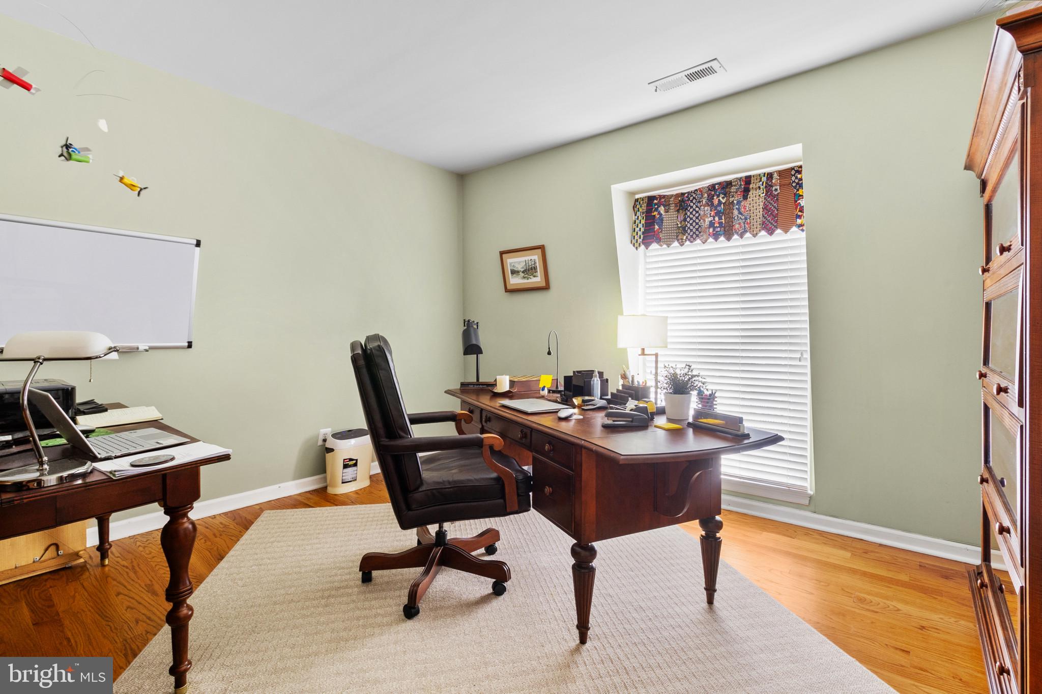133 Plum Street Moorestown, NJ 08057 - Photo 47 of 54 a view of a workspace with furniture and a window