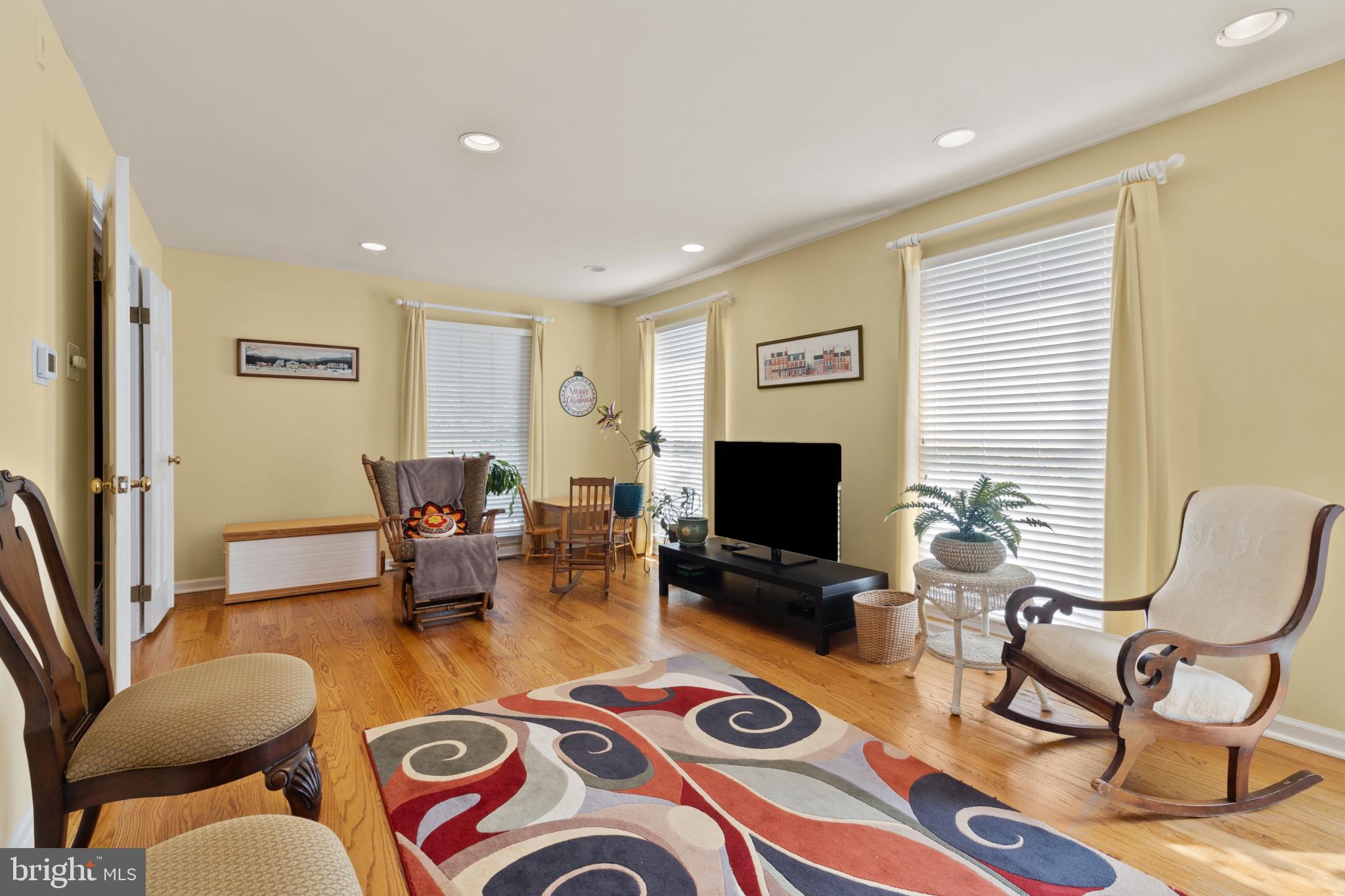 133 Plum Street Moorestown, NJ 08057 - Photo 10 of 54 a living room with furniture and a flat screen tv