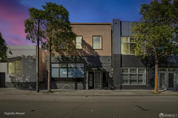 a front view of a building with street view