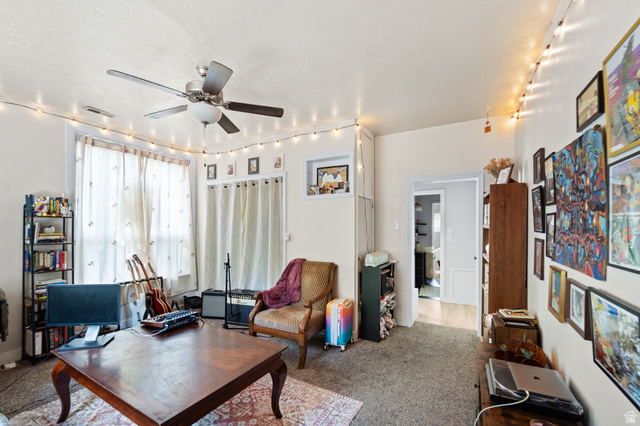 257 200 South Provo, UT 84606 - Photo 20 of 40 Living room with carpet floors and ceiling fan