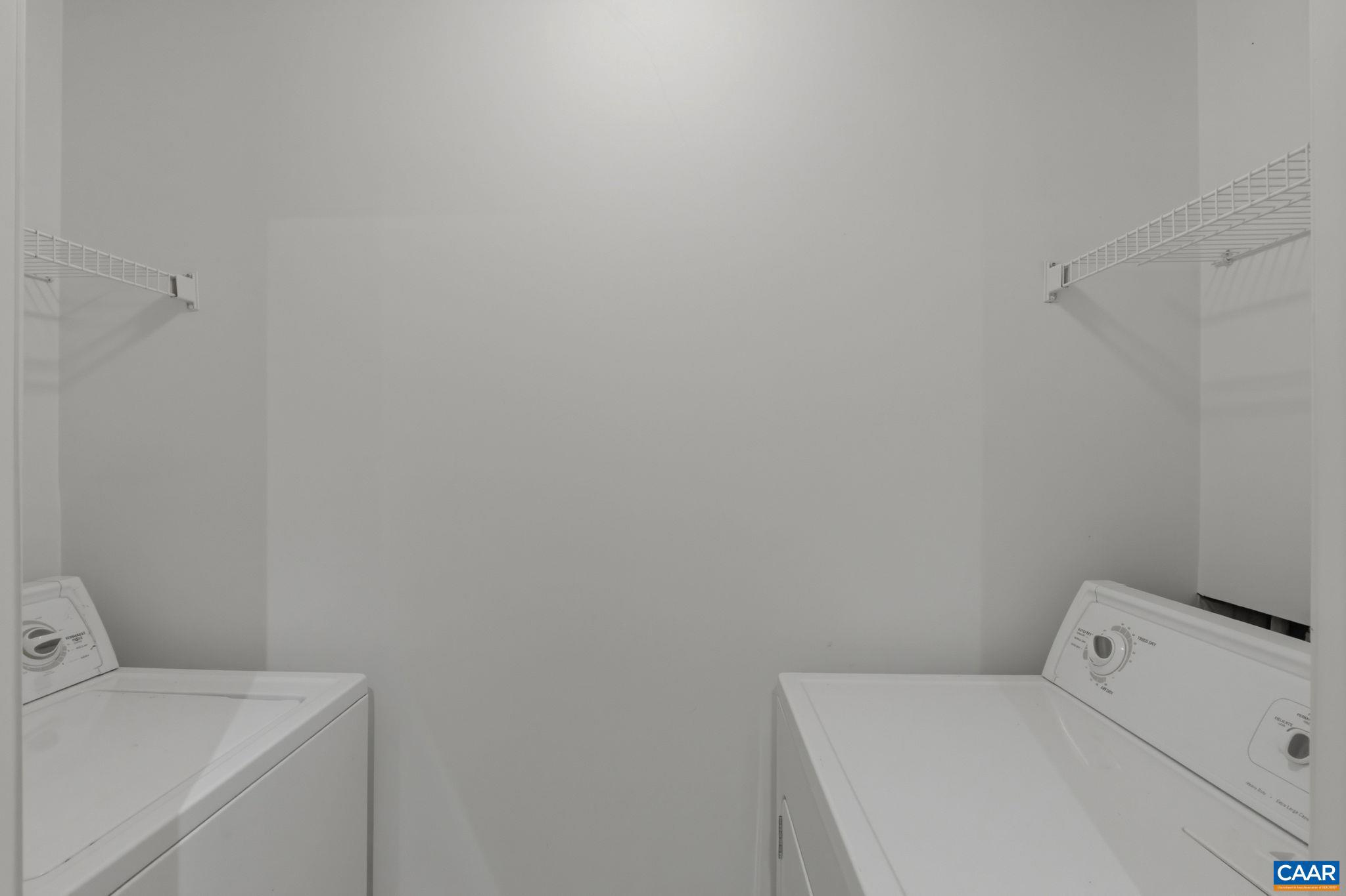 720 Walker Square, Unit 1B Charlottesville, VA 22903 - Photo 6 of 29 a utility room with dryer and washer