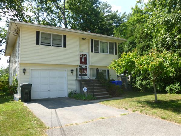 196 Mazarin Street Springfield, MA 01151 - Photo 1 of 25 a view of a house with a yard