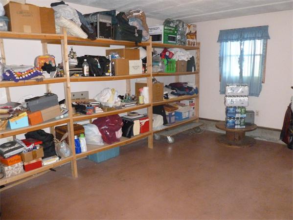 196 Mazarin Street Springfield, MA 01151 - Photo 14 of 25 a room with storage and a white cabinets