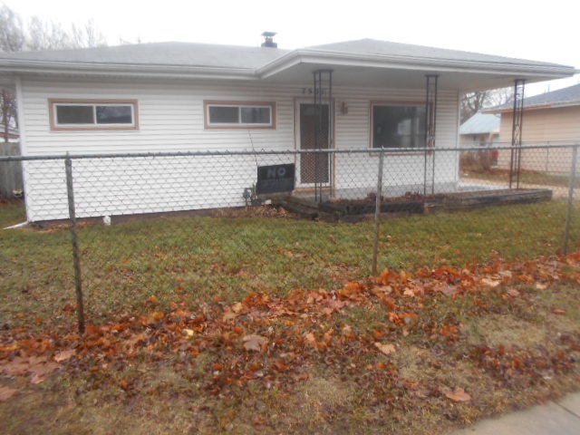 7501 Randy Road Machesney Park, IL 61115 - Photo 1 of 8 a view of a house with backyard