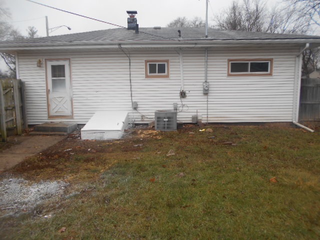 7501 Randy Road Machesney Park, IL 61115 - Photo 2 of 8 a view of a house with a yard