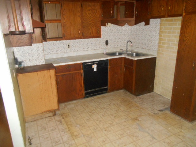 7501 Randy Road Machesney Park, IL 61115 - Photo 3 of 8 a bathroom with a sink and a mirror