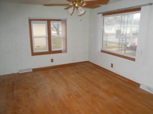 7501 Randy Road Machesney Park, IL 61115 - Photo 5 of 8 a view of an empty room with a window