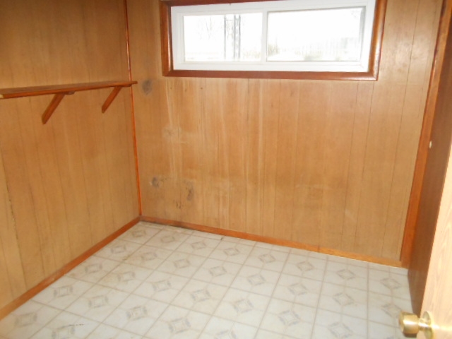 7501 Randy Road Machesney Park, IL 61115 - Photo 6 of 8 a view of an empty room with a window