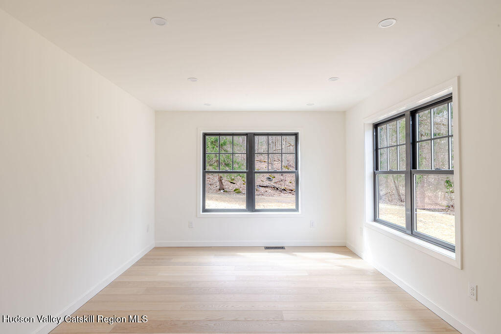 217 Anthony Street Copake, NY 12529 - Photo 11 of 23 an empty room with a window