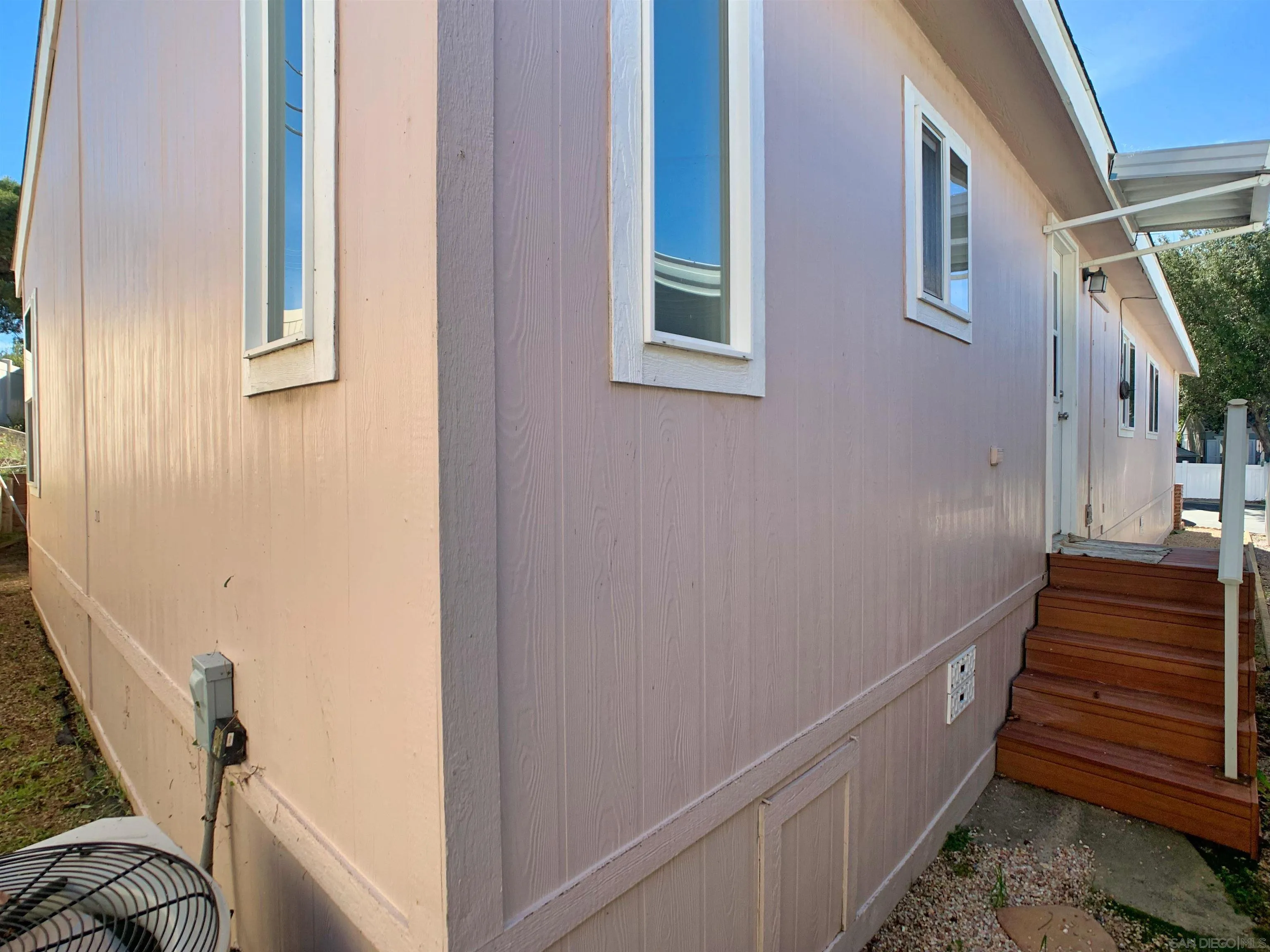 3505 Alpine Boulevard, Unit 57 Alpine, CA 91901 - Photo 7 of 28 View from the back towards the laundry room steps.