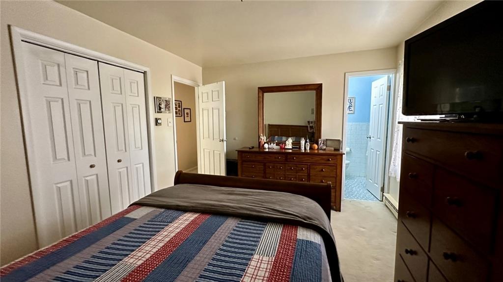 2525 Oakhill Road Gibsonia, PA 15044 - Photo 15 of 36 SPACIOUS PRIMARY BEDROOM WITH 1/2 BATH AND PLENTY OF CLOSET SPACE!